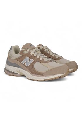 Sneaker uomo in mesh e camoscio colore beige. NEW BALANCE | M2002-RSI